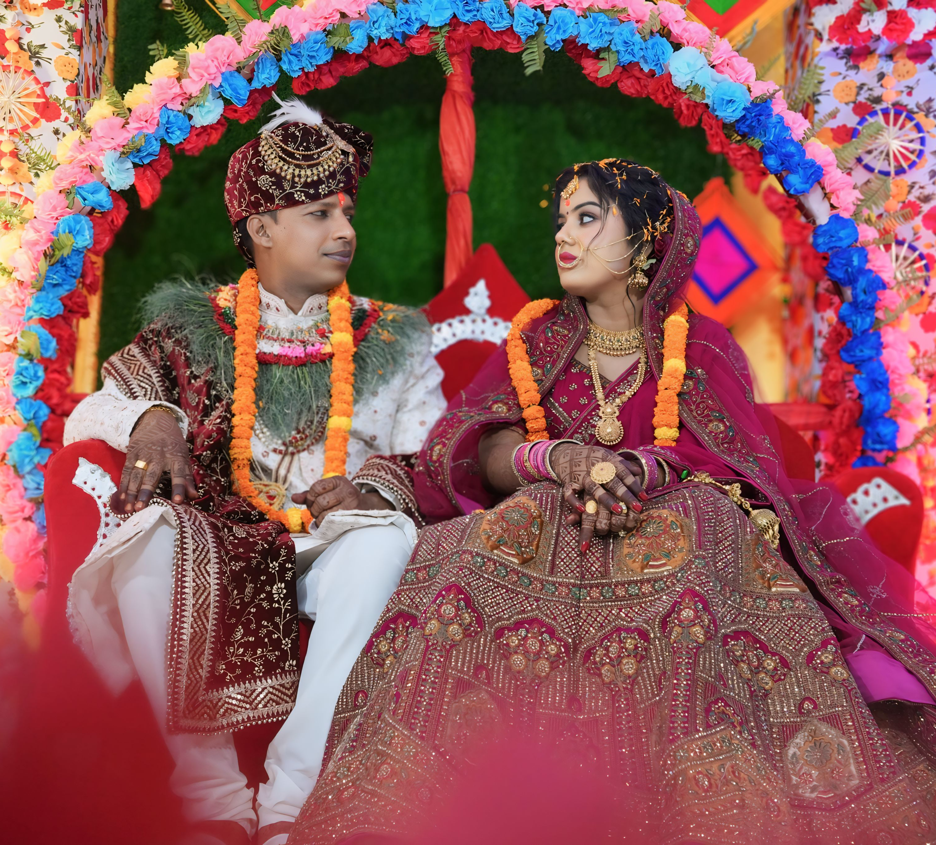 A fujifilm instant camera on a dark electric blue background.